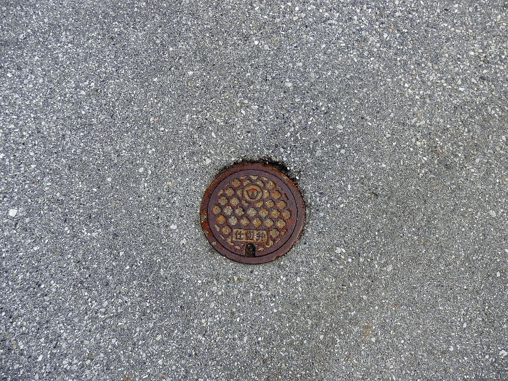 Manhole in Santou town